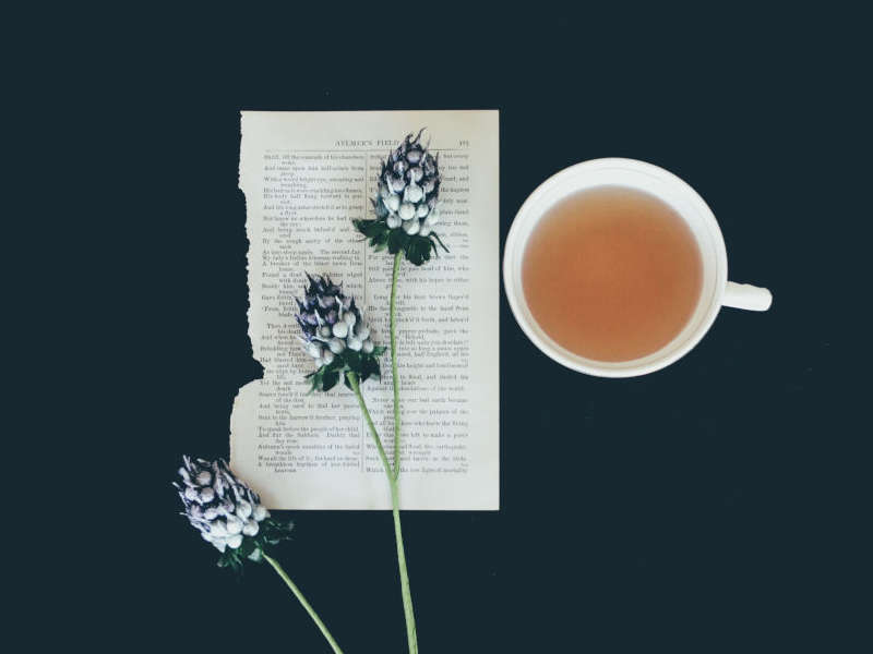 tea cup and 3 flowers